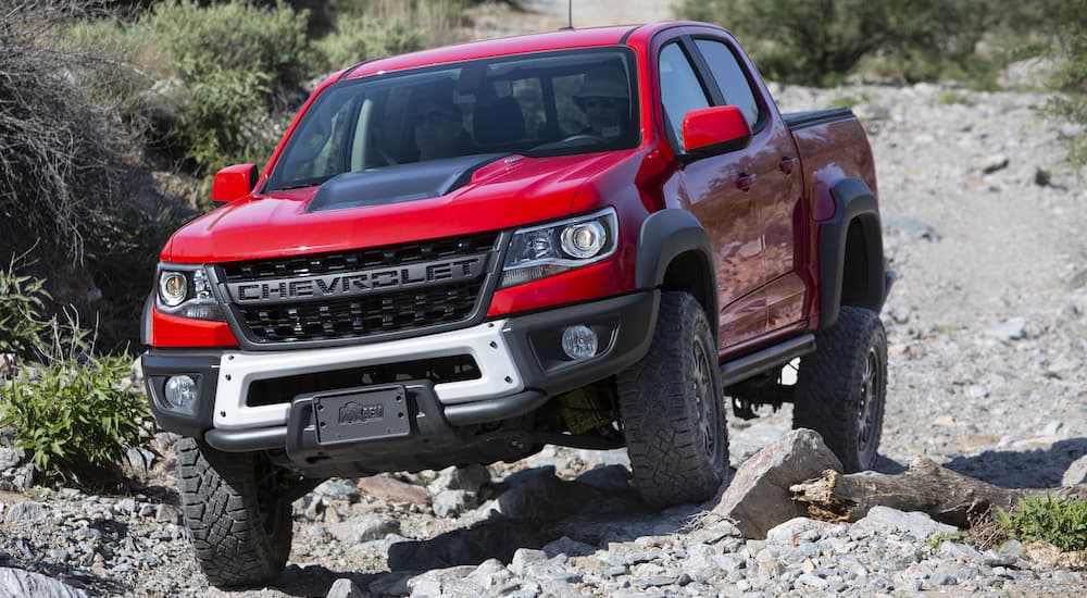 A red 2019 Chevy Colorado ZR2 Bison is shown from the front at an angle after leaving a used Chevy dealer.