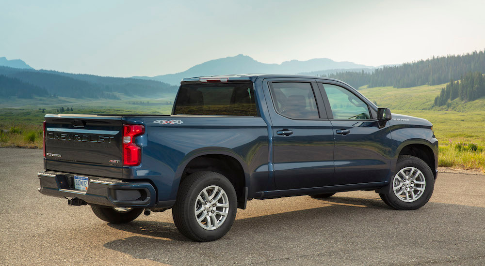 A blue 2020 Chevy Silverado 1500 RST is shown from the side.