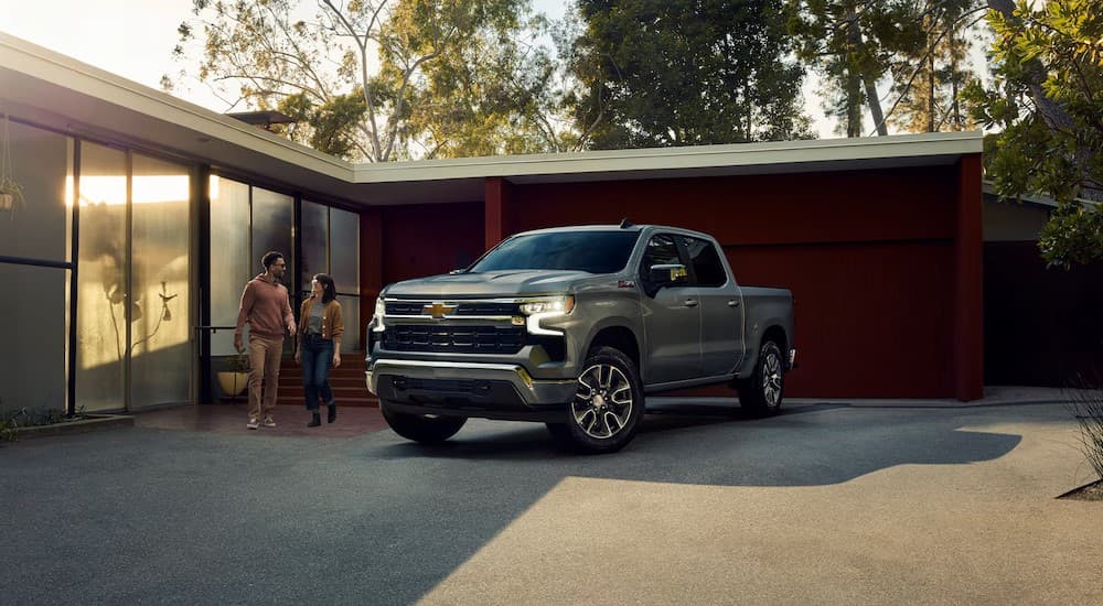 A silver 2025 Chevy Silverado 1500 Z71 parked on a driveway.