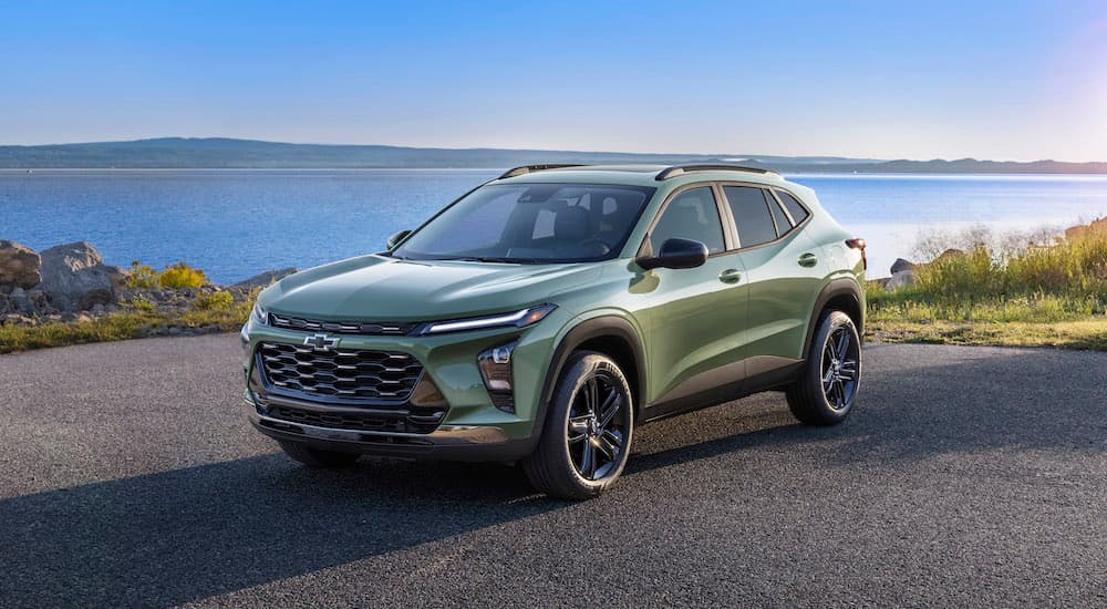 A green 2025 Chevy Trax for sale from the side.