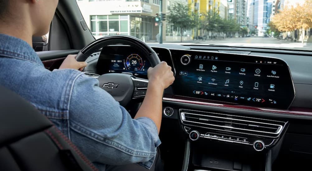 A person driving in a 2026 Chevy Traverse Z71.