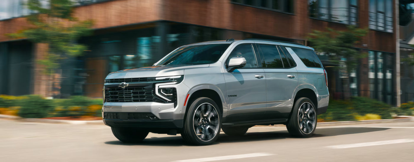 Silver 2026 Chevy Tahoe for sale on a test drive